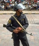 Photo of an policeman armed for riot control