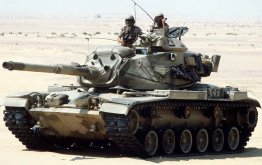 Photo of a U.S. tank in desert combat