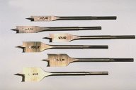 photo of 6 spade bits used to drill holes in wood with an electric power drill