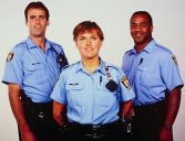photo of a uniformed policewoman and two policemen