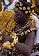 Photo of a Fanti chief from Ghana dressed for a ceremonial occasion