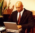 Photo of a businessman with a laptop computer