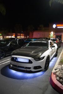 A black and white car at San Diego's Halloween Car Meet.